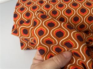 Bomuldsjersey - retro grafisk i orange brune toner